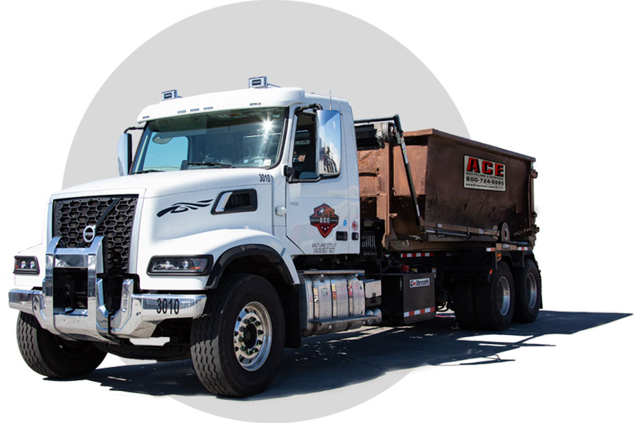 ACE roll-off truck carrying a rental dumpster